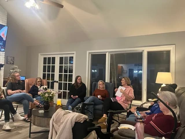Women gathered in the living room for a One Hope women's night